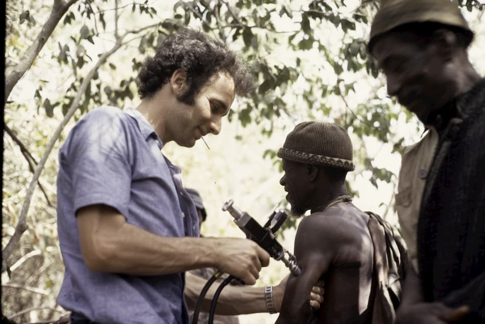 Vaccinations. Roel Coutinho uses a jet injector, Ziguinchor, Senegal 1973.